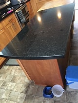Black galaxy granite kitchen island